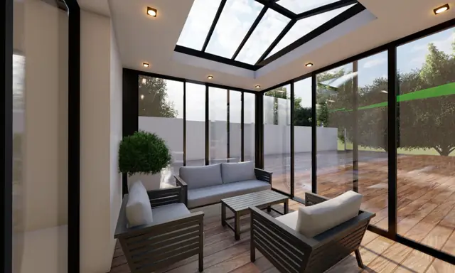 Véranda aluminium avec toit en verrière et salon intérieur